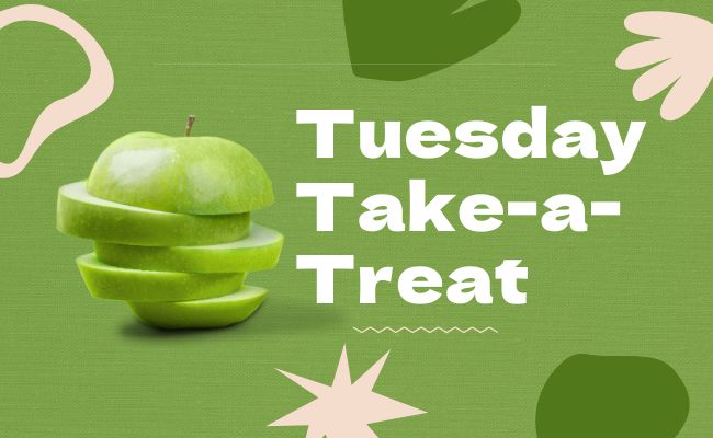 a cut green apple with slices stacked on top of each other. Tuesday take a treat